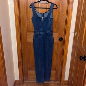Bebe denim jumpsuit- size 8. Never worn